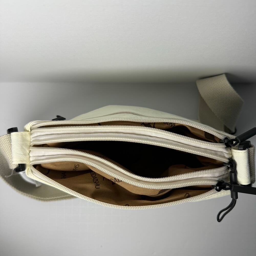 NEW Cream Nylon Crossbody Travel Bag Lightweight Multi Pocket Shoulder Purse - Picture 8 of 9